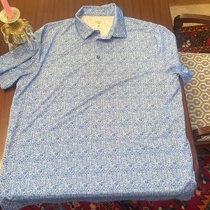 Sophisticated Blue Polo Shirt with Intricate Pattern
